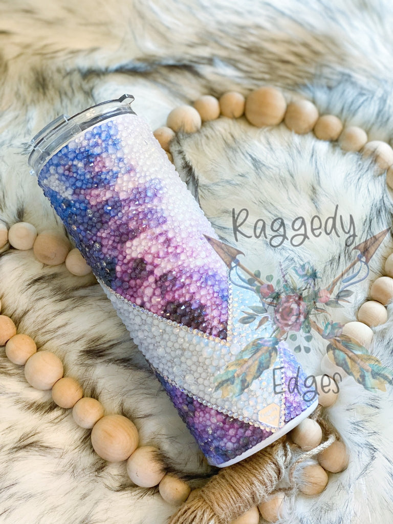 https://raggedyedges.com/cdn/shop/products/lilac-purple-and-blue-tie-dye-fabric-v-split-rhinestone-tumbler-236166_1024x1024.jpg?v=1646307300